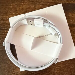 NEW. Genuine apple USB to lightning cable